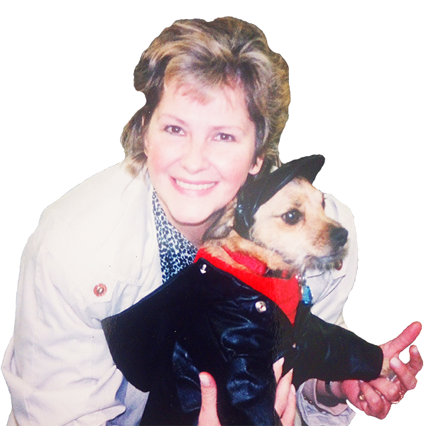 Teddykins founder holding her dog Teddy